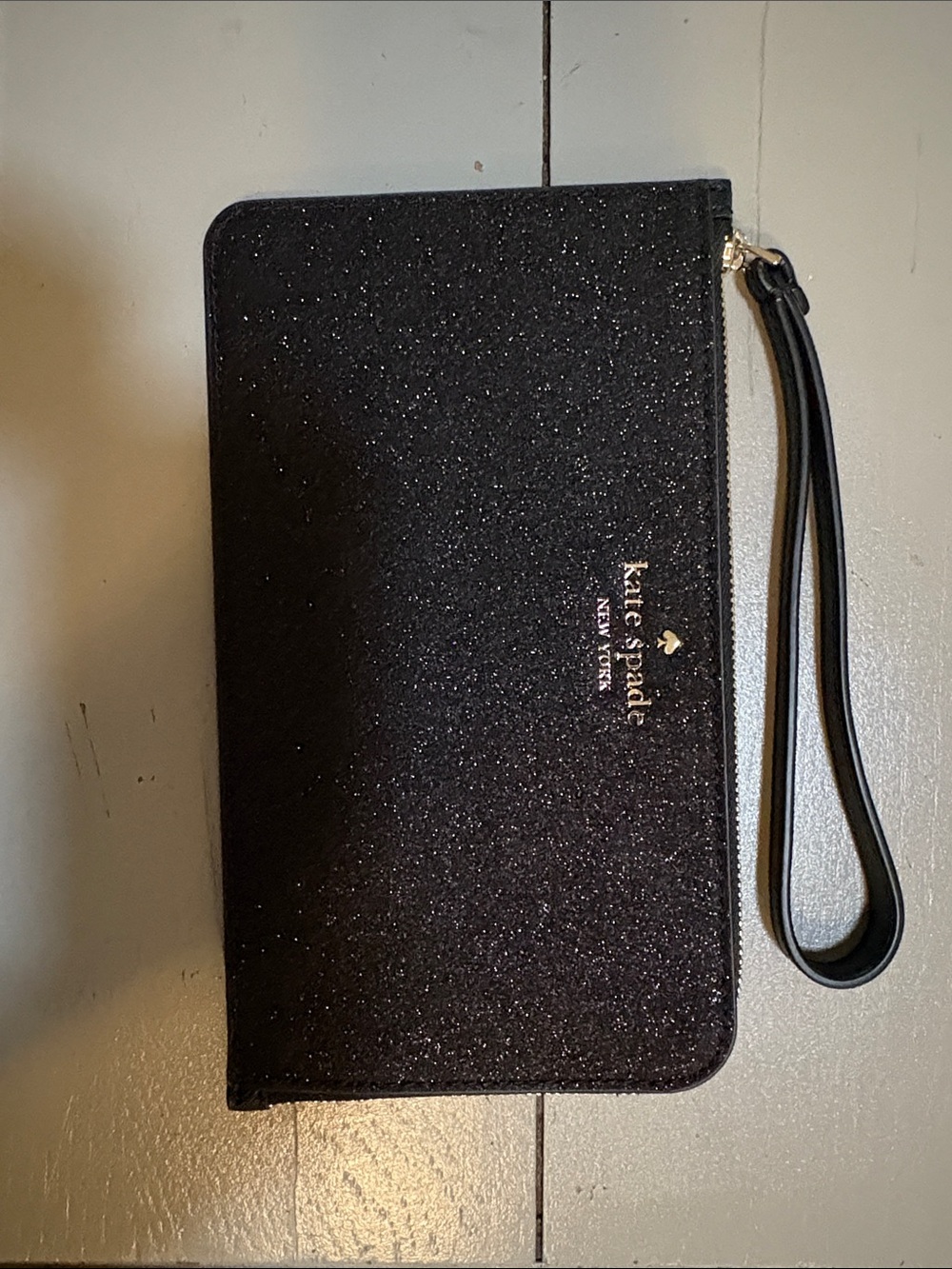 kate spade Black Glitter Wristlet with Gold Logo